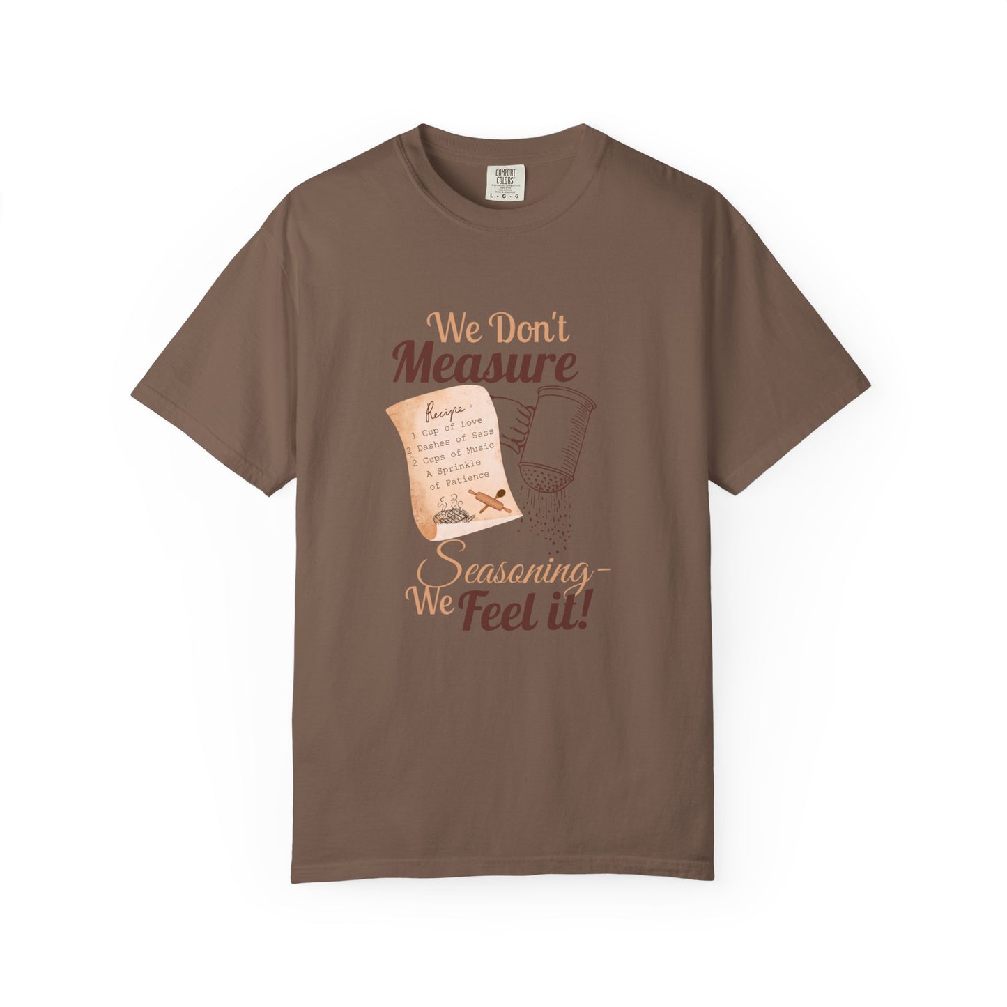 Cozy T-Shirt: "We Don't Measure Seasoning, We Feel It!" - Perfect for Home Cooks & Food Lovers