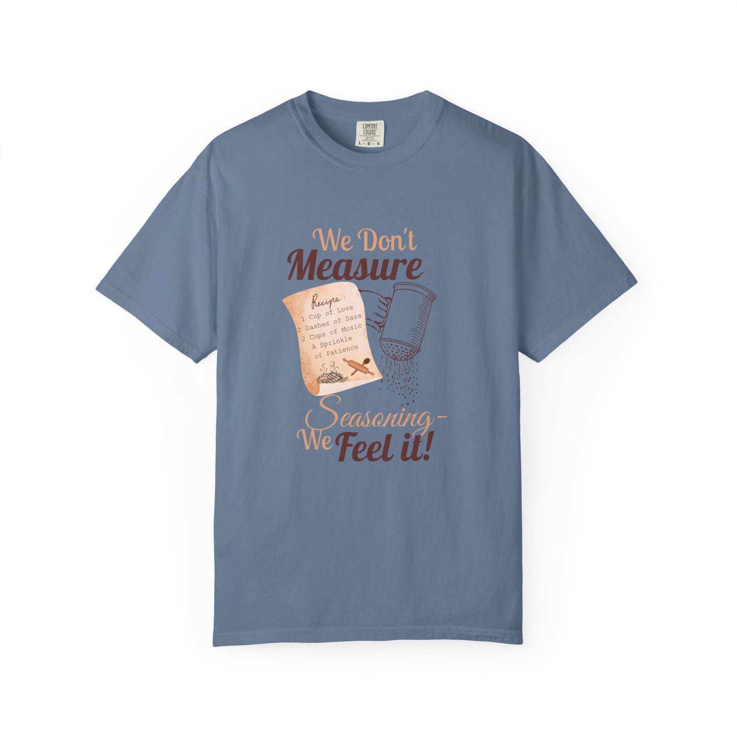 Cozy T-Shirt: "We Don't Measure Seasoning, We Feel It!" - Perfect for Home Cooks & Food Lovers