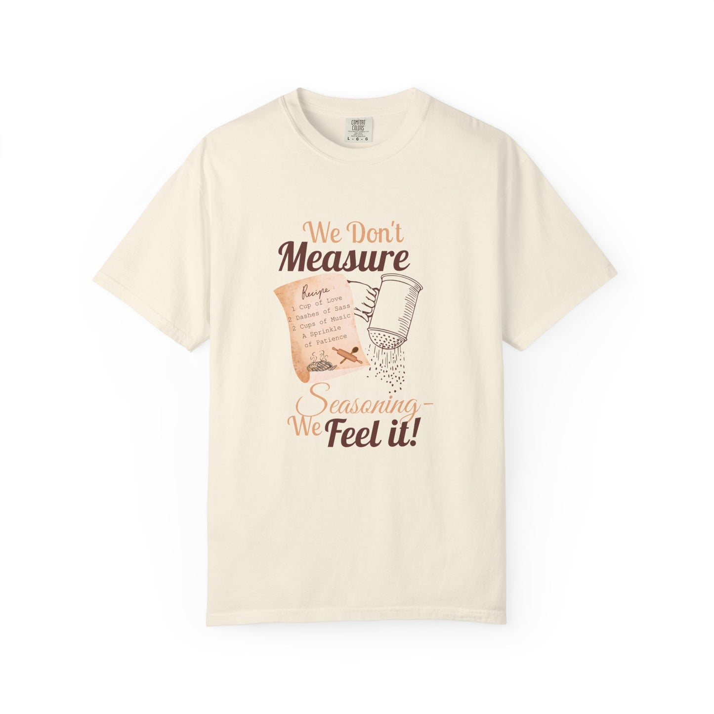 Cozy T-Shirt: "We Don't Measure Seasoning, We Feel It!" - Perfect for Home Cooks & Food Lovers