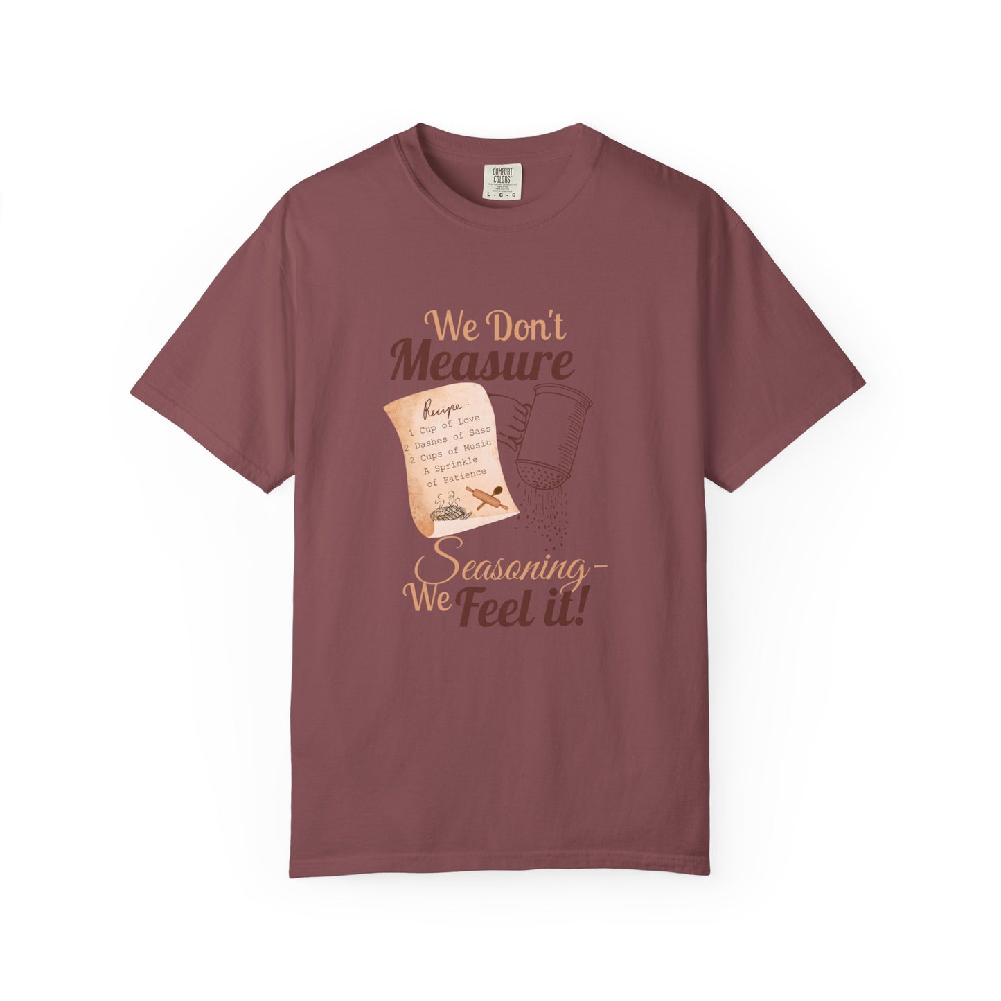 Cozy T-Shirt: "We Don't Measure Seasoning, We Feel It!" - Perfect for Home Cooks & Food Lovers