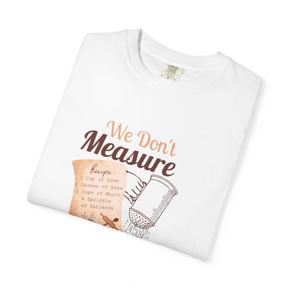 Cozy T-Shirt: "We Don't Measure Seasoning, We Feel It!" - Perfect for Home Cooks & Food Lovers